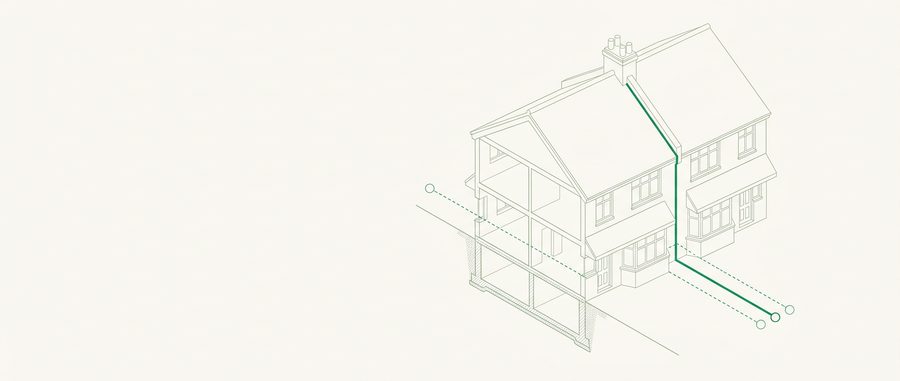Two adjoining houses with the shared party wall highlighted and notice zones marked on the ground